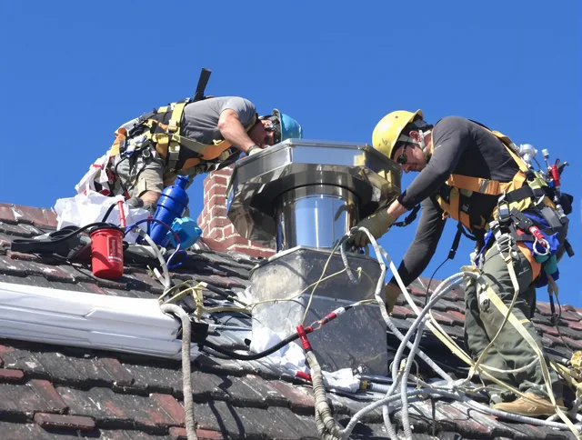 Protective chimney cap installed by East Hartford Chimney Sweep in East Hartford, CT